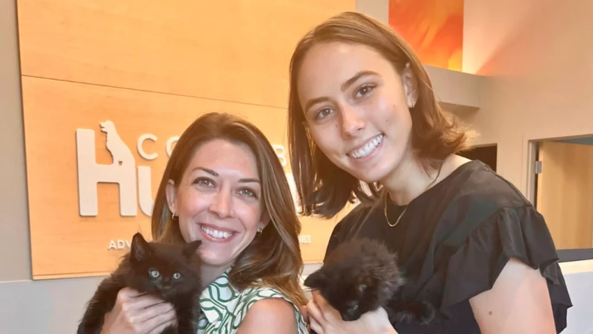 Lydia and Audrey holding kittens